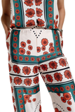 Satin Creme Flared Pants With Floral Design