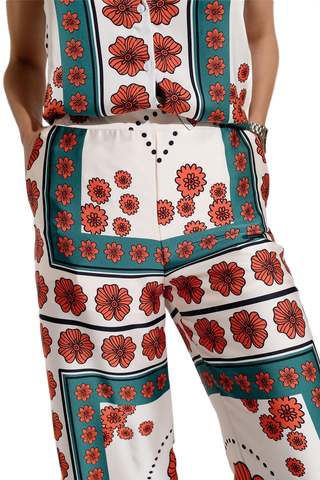 Satin Creme Flared Pants With Floral Design